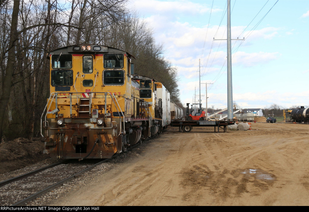 The crew begins to tie on to the first cars on the main before starting the work of digging out the outbounds